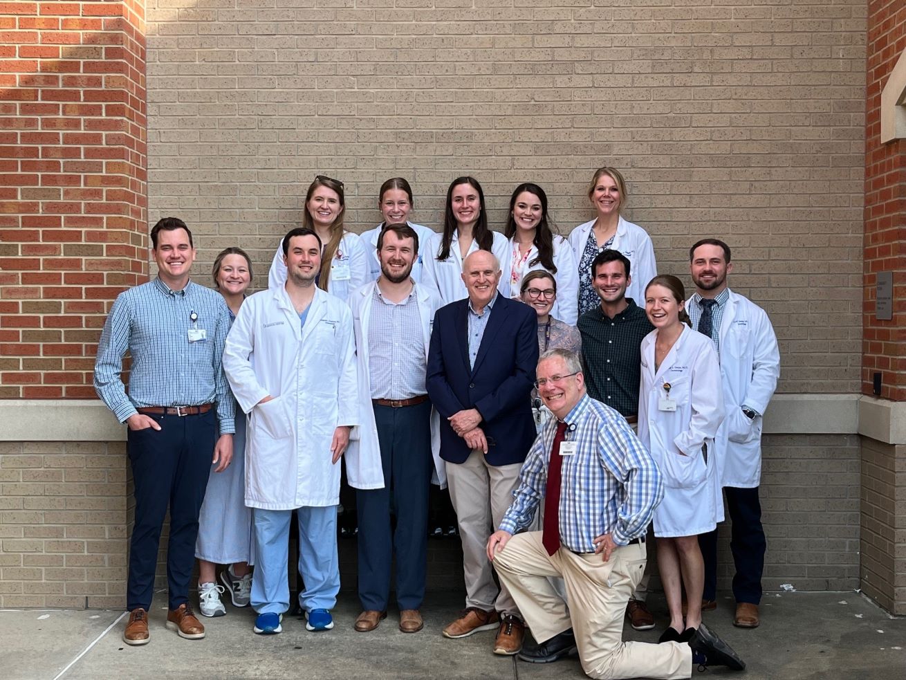 Dr. Jeffrey Callen, April Grand Rounds speaker, pictured with our residents and Dr. Robert Brodell.